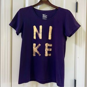 Nike Woman’s Athletic Cut Tee in Deep Purple with Metallic Gold Logo Size M